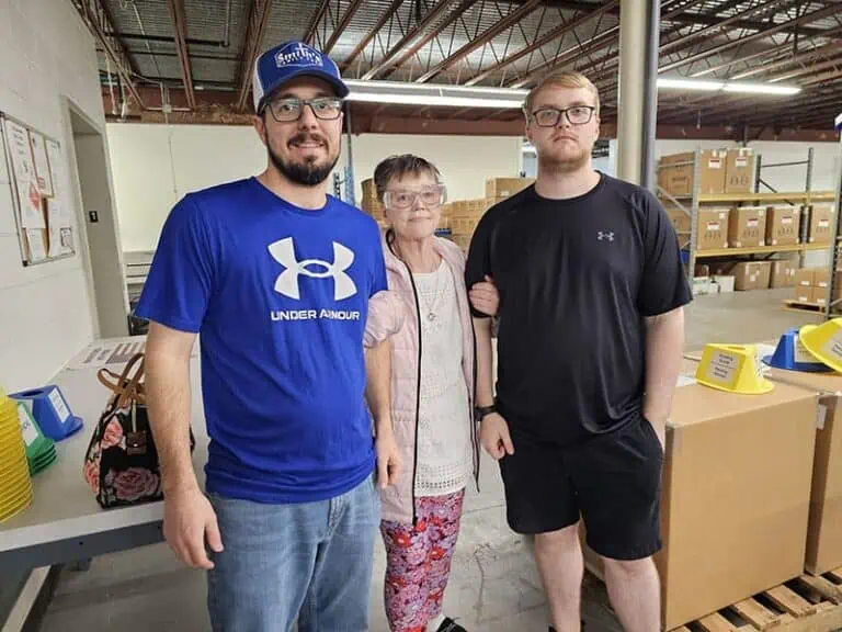 Andersen Duo Lend Helping Hand To Colleague In Need