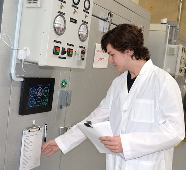 Tech performing sterilization services at Andersen Scientific - Andersen's Contract Sterilization facility