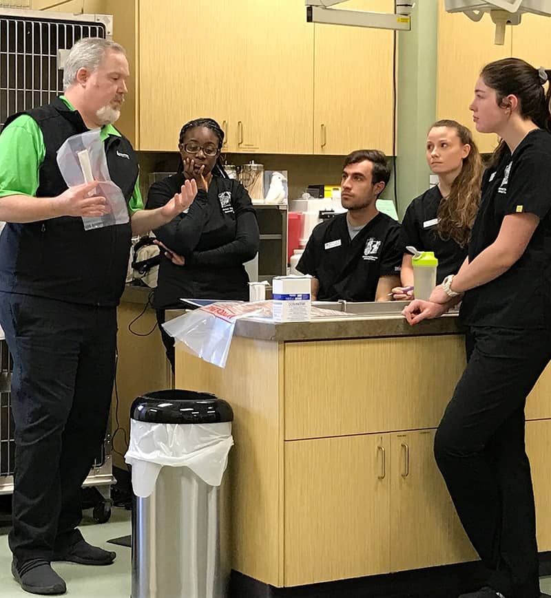 Norman Lyons, account rep, gives a sterilizer training at an avian & exotic animal clinic